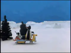 Pingu and family on snowmobile