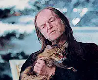 Buffy's mom holding a cat