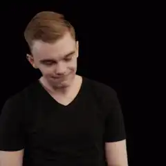 Man smirking and crossing arms