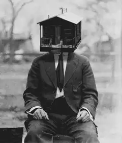 Man with house for a head