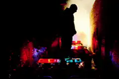 Silhouette on police car lights