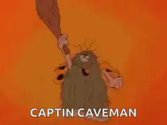 Captain Caveman dancing with club