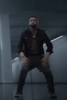 Man in black jacket dancing