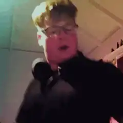 Man with headphones headbanging