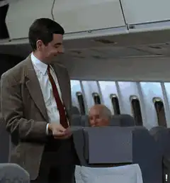 Mr. Bean shows his boarding pass