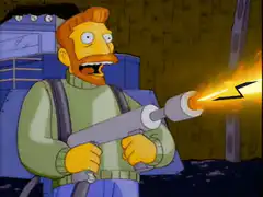 Lenny firing a flamethrower