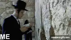 Jewish man praying at the Western Wall
