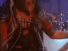 Guitarist headbanging on stage