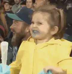 Toddler with blue cotton candy face