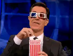 Stephen Colbert eats popcorn in 3D glasses