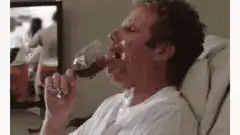 Ron Burgundy drinking wine