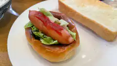 hot dog with lettuce and toast