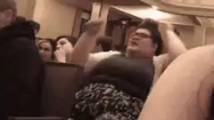 Woman dancing in theater