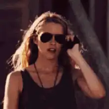 Woman walking away from explosion