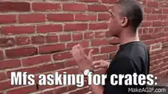 Man gesturing at brick wall