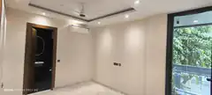 Empty room with ceiling fan and balcony view