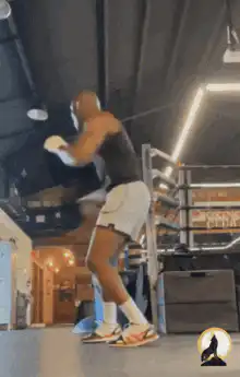 Boxer shadow boxing in gym