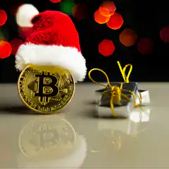 Bitcoin with Santa hat and Christmas gifts