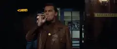 Leonardo DiCaprio smoking in Django Unchained