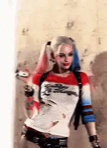 Harley Quinn holding a gun