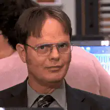 Dwight Shushes and Smirks