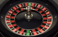 Roulette wheel spins and lands on zero