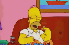 Homer Simpson eating chips and reacting
