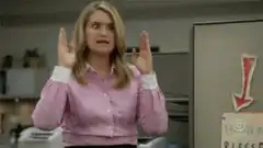 Angela Martin hands up in office