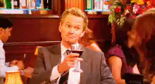 Ted Mosby holding wine glass