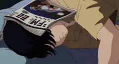 Anime character sleeping with newspaper on face