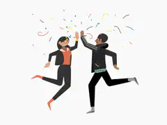 Man and woman high-fiving with confetti