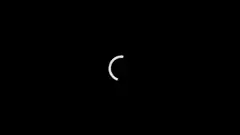 White loading spinner on black background