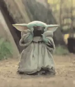 Baby Yoda drinking from a cup