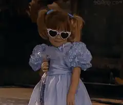 Violet Beauregarde in blue dress and heart sunglasses