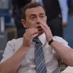 Mr. Bean shocked and covers mouth