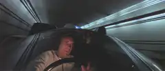 Doc Brown in DeLorean time machine