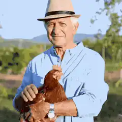 Old man holding a chicken
