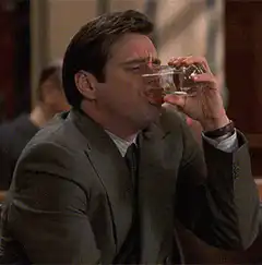 Jim Carrey spits out water