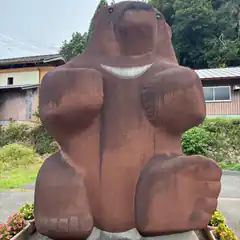 large brown bear statue