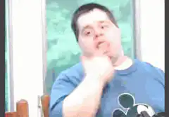 Man in headphones thinking then getting an idea