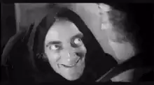 Witch cackling evilly