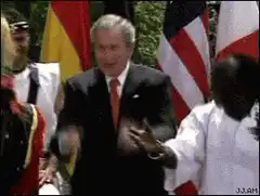 George W. Bush waving awkwardly