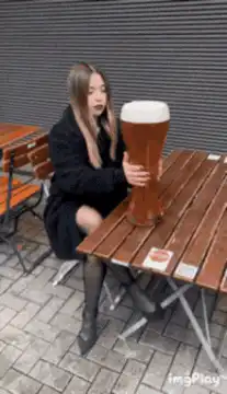 Woman spills giant beer