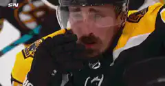 Crying hockey player on bench