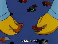 Simpsons hands groaning puzzle pieces