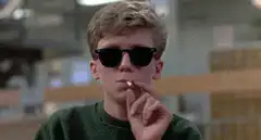 Spencer Daniels smoking and blowing smoke