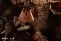 Mayor of Halloween Town smiles and shows Zap Off sign
