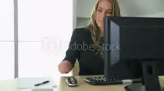 Woman typing random characters on computer