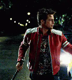 Brad Pitt throws a baseball bat