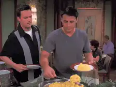 Joey serving eggs on Friends